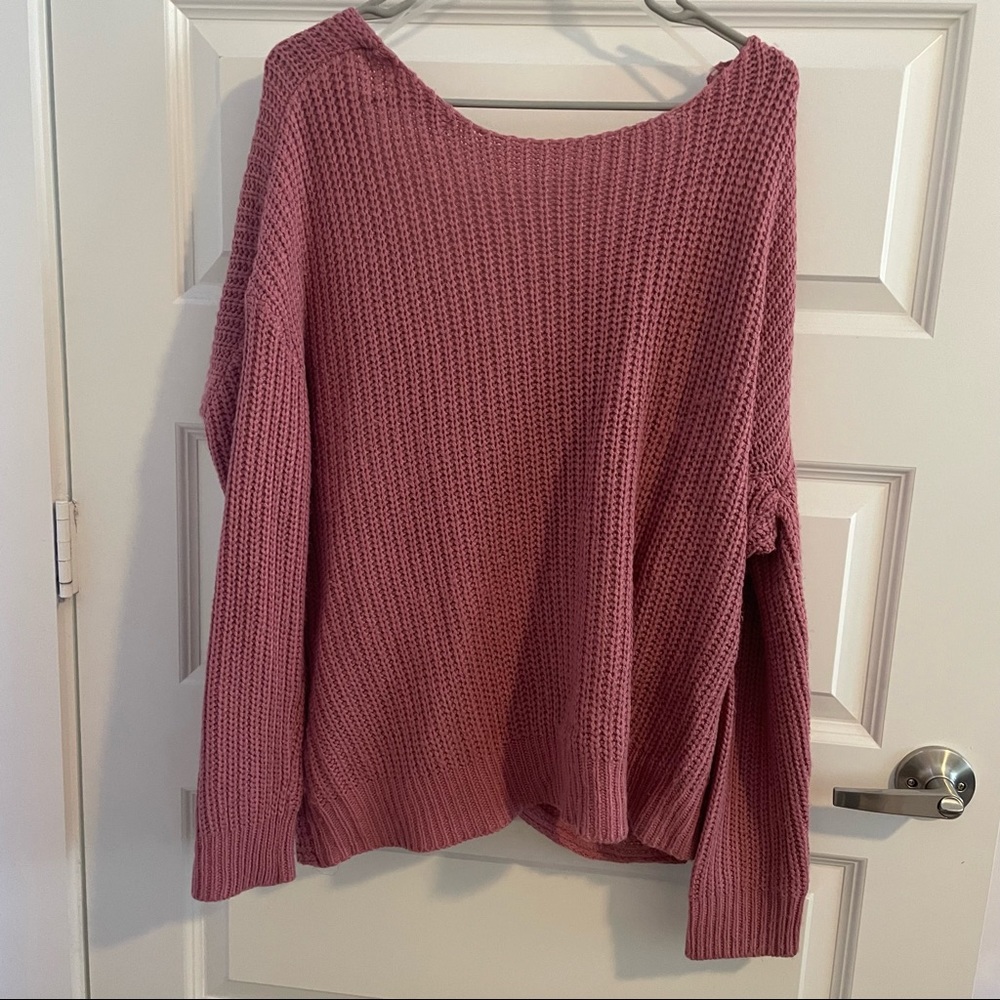 Pink sweatshirt can wear it backwards towards your liking.